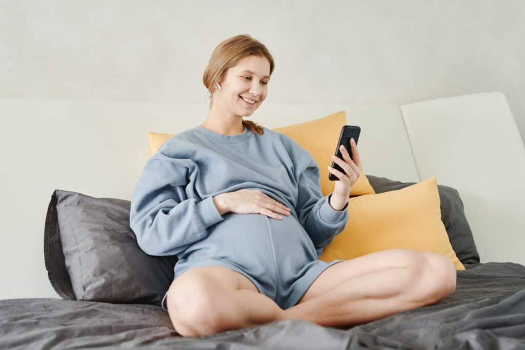 Pregnant woman on cellphone